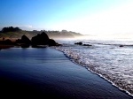 Rocks, water, sun on the beach Helguera