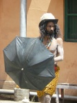 sadhu with umbrella