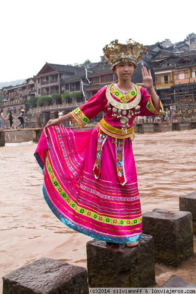 Fenghuang
La gente viva alrededor del río. Foto del traje típico de Fenghuang
