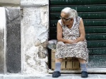 anciana vendedora ambulante en Palermo