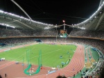 Estadio olímpico de Atenas con la llama olímpica durante los JJOO 2004