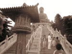 Climbing the stairs leading to the Buddha