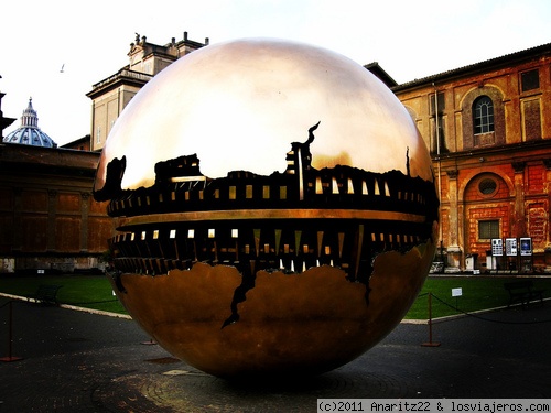 In the courtyard of the pineapple sculpture Sphere with Sphere - Italy