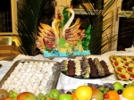 Buffet artístico Empress
Buffet, Empress, artístico, noche, tropical, cubierta, superior, piscina, preparan, buffet, especial, muchas, figuras, hechas, frutas, básicamente