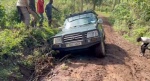 Atascados en el barro
Barro, pista, Uganda