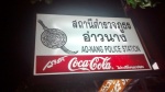 cartel de la policia de ao nang patrocinado por cocacola