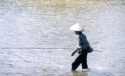 Pescando en el rio Nam Tha.
Asian Fisher